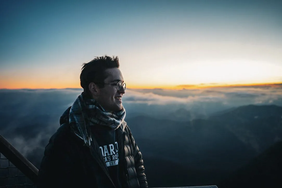 ben above the clouds at sunset